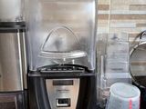 a blender and a blender sitting on a kitchen counter