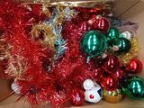 a box full of christmas ornaments that are in the box