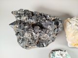 a rock and a rock on a white surface