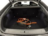 a trunk of a car with an air compressor in it