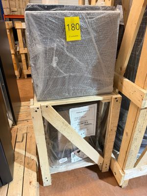 a stack of boxes sitting on top of a pallet in a warehouse