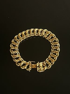 Bracelet articulé en or jaune 18K, les mailles entrelacées. - Photo 1