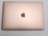 a laptop with an apple logo on the back of it