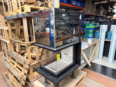 a fish tank sitting on top of a stack of pallets