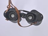 a pair of binoculars that are sitting on a table