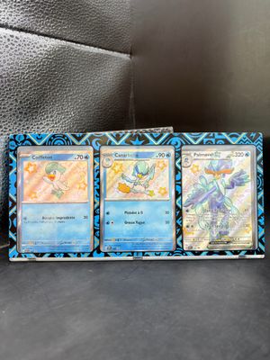 a couple of cards sitting on top of a table next to each other