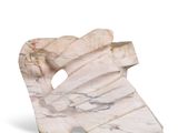 marble sculpture of a bird on a rock on a white background