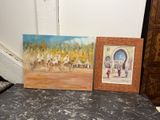 deux tableaux posés l'un à côté de l'autre sur la table