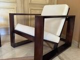 a chair that is sitting in the middle of a room