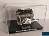 a model of a motor engine in a display case