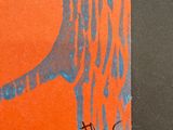 an orange and blue painting of a bird on a tree