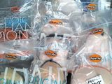 a lot of stuffed animals that are wrapped in plastic bags