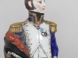 a figurine of a man in a military uniform