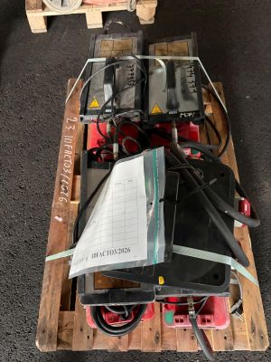 a wooden pallet with a bunch of electronics on top of it