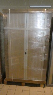 a picture of a bathroom with a toilet and a shower stall