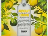 an advertisement for absolut lemon vodka with a lemon tree in the background