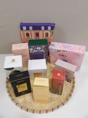many different types of perfumes on the table