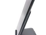 a cell phone that is sitting on a stand