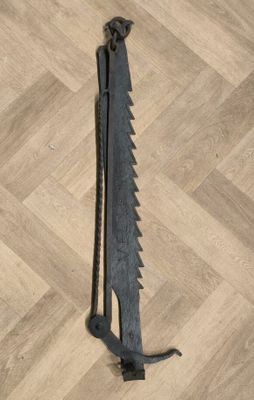 a large knife that is on the floor on the floor