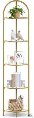 a gold shelf with a plant on top of it