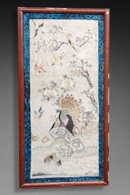 an image of a picture of a bird on a branch with flowers