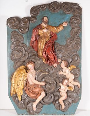 une image représentant une statue de Jésus et des anges dans les nuages