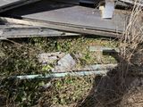 a pile of junk sitting in the middle of a field