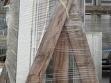 a large pile of windows sitting on top of a pallet