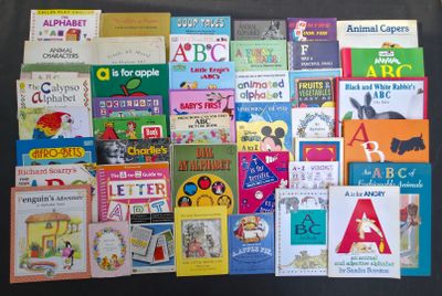 many children ' s books on the table together