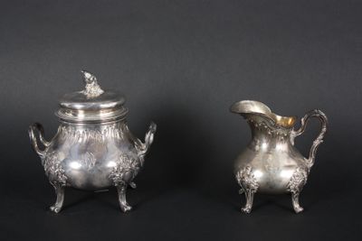 pair of antique silverplated sugar and creamers on stands