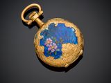 an antique gold and enamel pocket watch with flowers on it