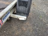 a truck that has a broken door on the back of it