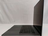 an open laptop computer sitting on top of a white table