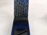 a set of drill drills in a blue case on a white surface