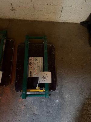 two suitcases that are sitting on the floor next to each other
