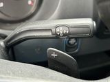 a close up of a steering control in a car