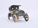 a toy car that is sitting on a white surface