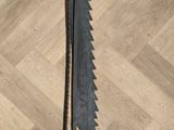 a large knife that is on the floor on the floor