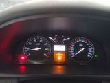 a close up of the dashboard of a car with the lights on