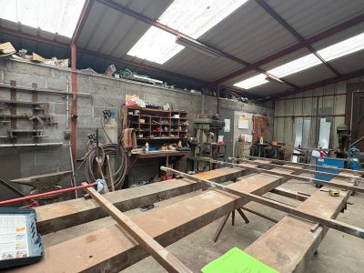 a room that has a lot of wooden benches in it
