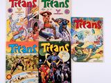 trois livres pour enfants sont alignés sur une surface blanche
