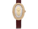a close up of a wrist watch with diamonds on it