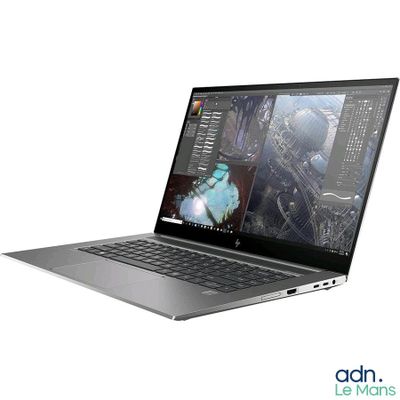 a laptop with a picture of a city on the screen