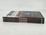 three star wars books are stacked on top of each other