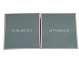 a pair of framed photographs with the words bernard and bernard on them