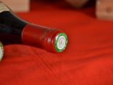 a bottle of wine that is sitting on a table