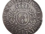gros plan d'une pièce de monnaie surmontée d'une couronne