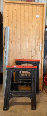 two stools and a table in a room