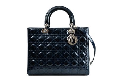 a black handbag with a chain on the handle