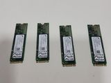 three memory modules are sitting next to each other on a table
